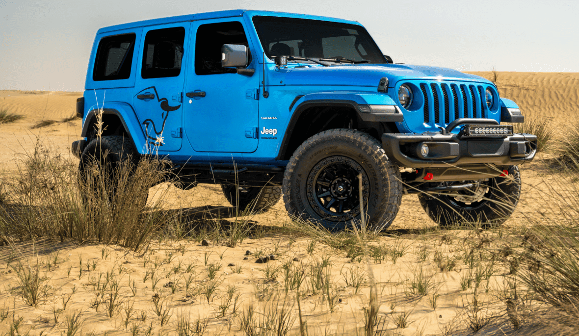 Modified Jeep Wrangler on RAMY suspension and wheels in the desert
